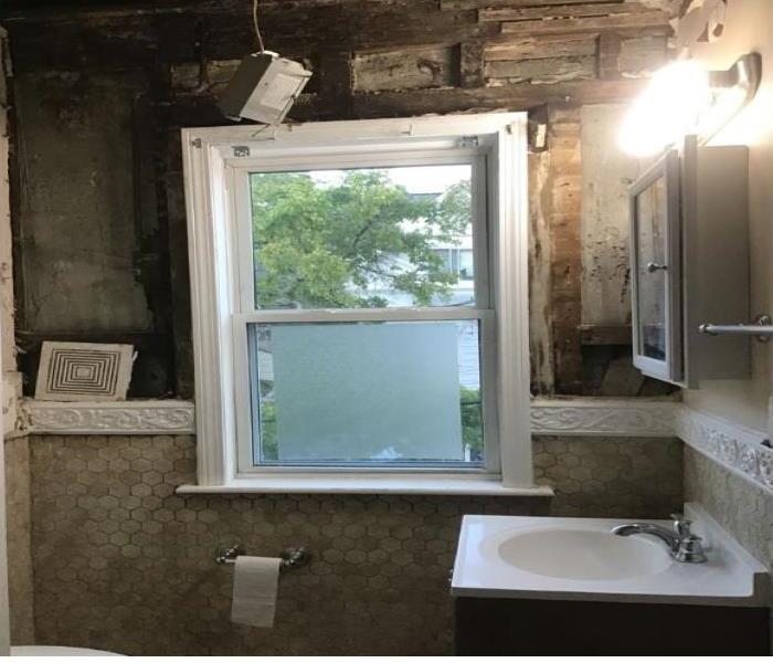 bathroom wall affected by fire 